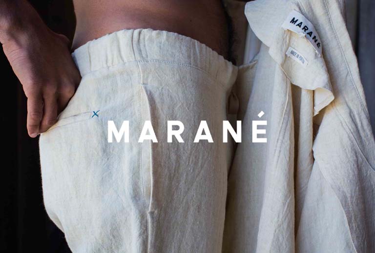 Elegant card design featuring the name "Marané" with web design, development, and ecommerce icons.